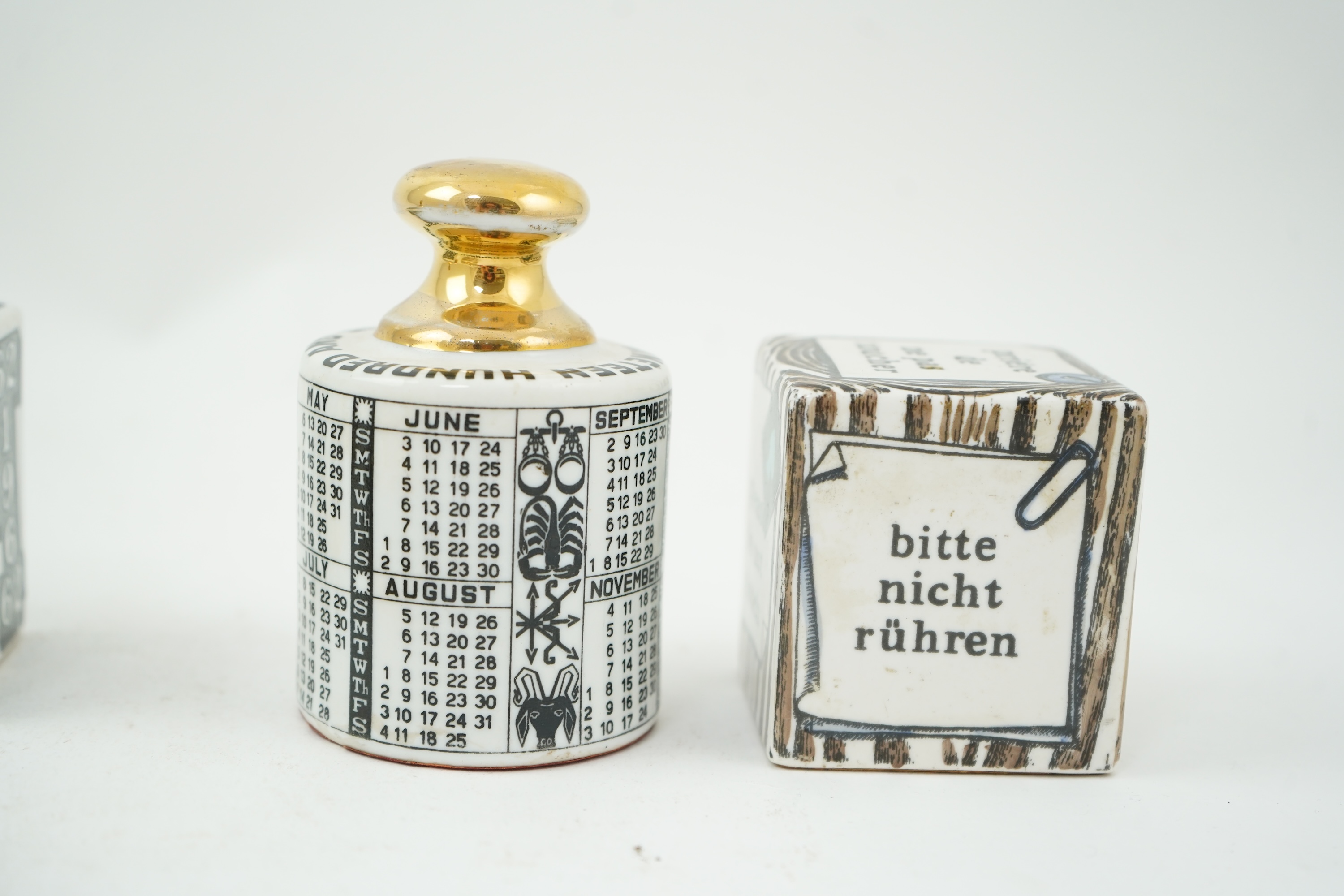 Piero Fornasetti (Italian, 1913-1988): A collection of Fornasetti desk items and dishes